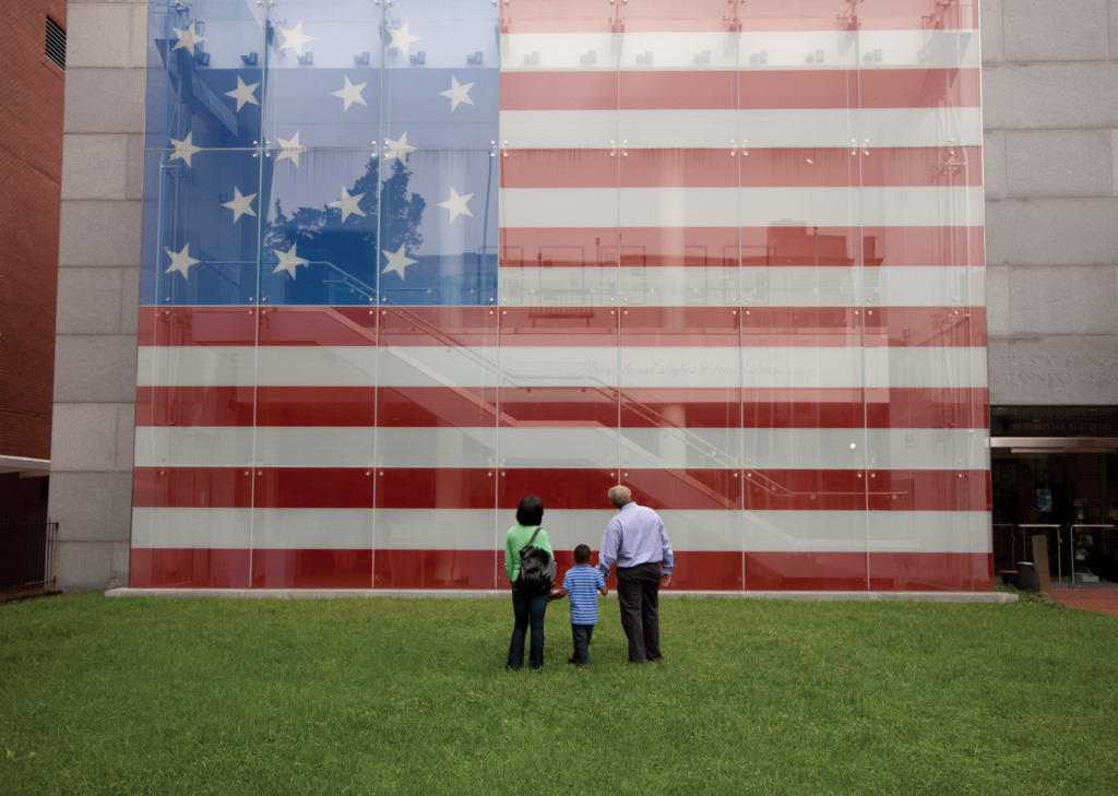 A family enjoying the Star-Spangled Banner Flag House.
