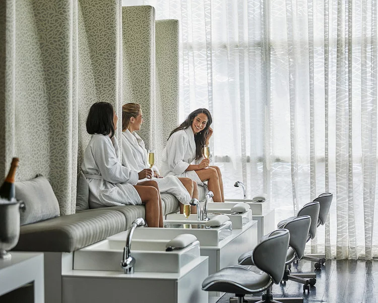 Women getting pedicures in a salon.