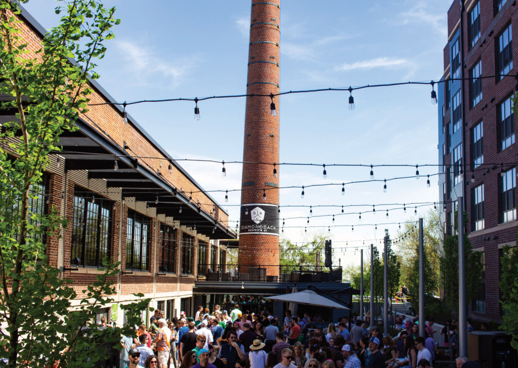 Patrons enjoying the outdoor patio at Diamondback Brewing Company.