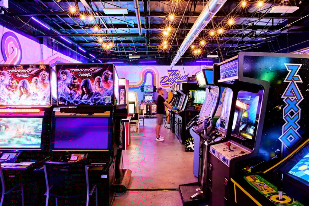 A man plays a video game at Peabody Heights Brewery