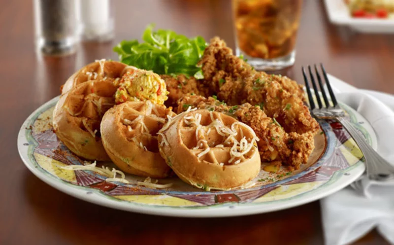 Mini waffles and fried chicken on a plate 