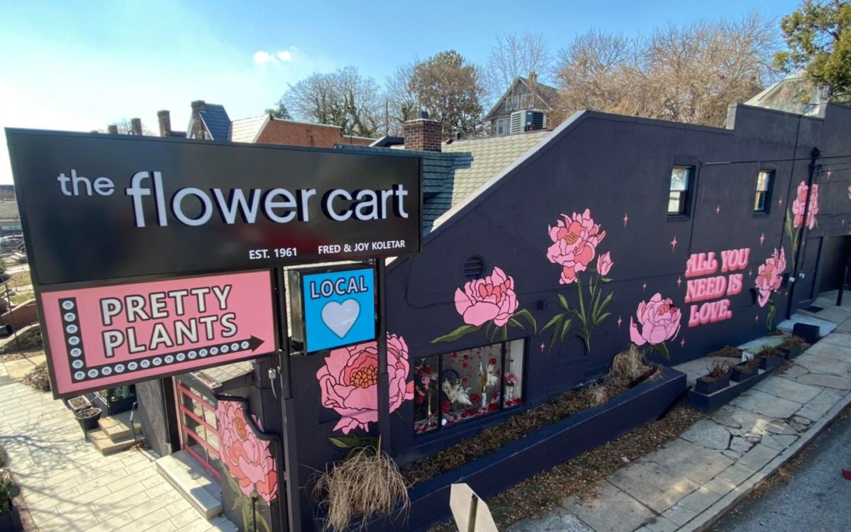 Wide shot of the flower mart's storefront