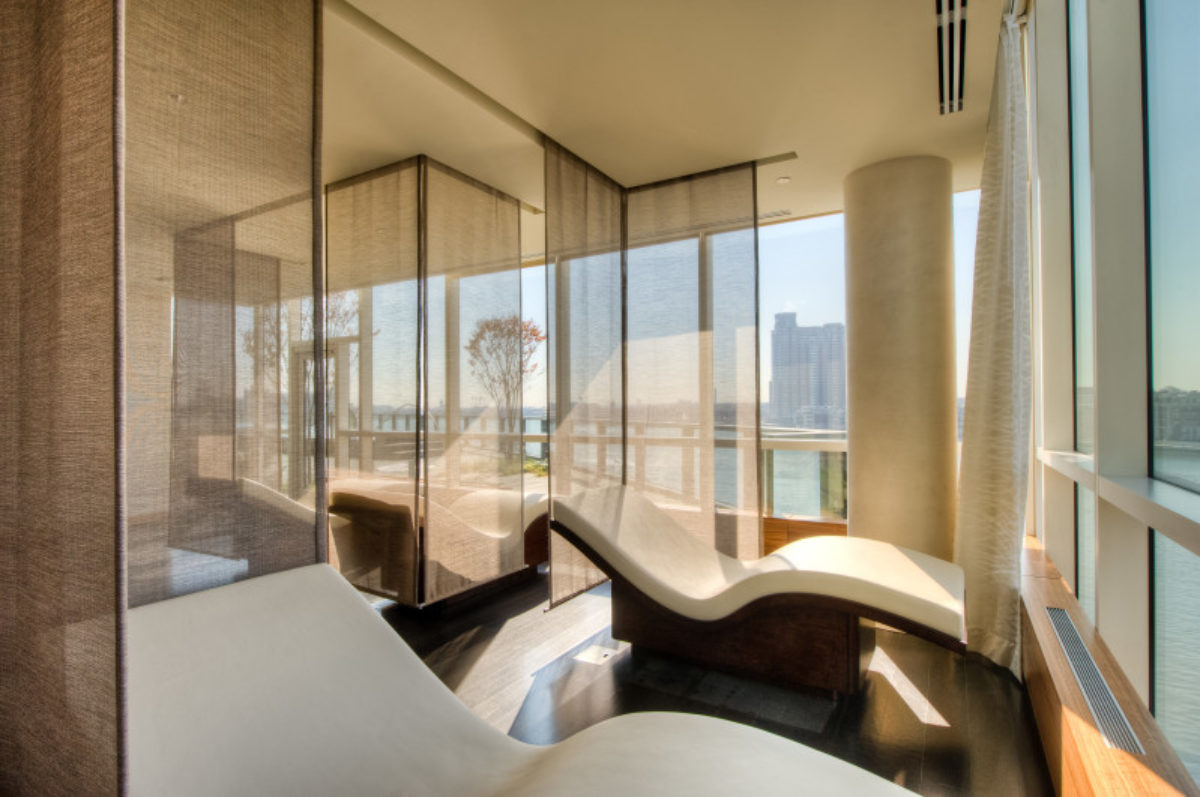 Reclining chairs by the windows in the Four Seasons Hotel Baltimore's spa.