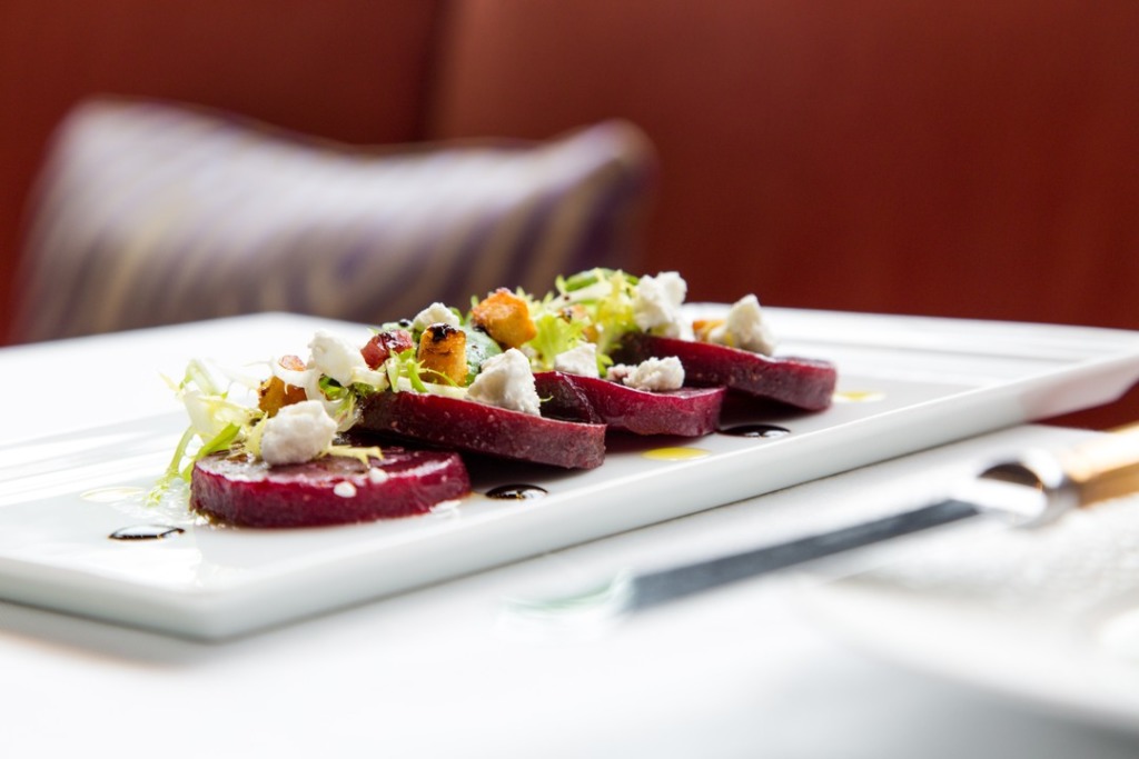 Plate of food on table at the Charleston